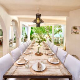 Dining area with long table — Casa Coco, Isla Mujeres, Mexico