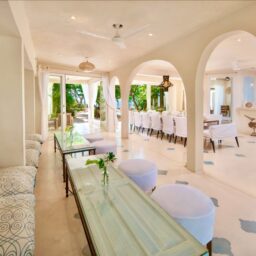 Dining area with arched columns — Casa Coco, Isla Mujeres, Mexico