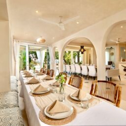 Dining area with long table — Casa Coco, Isla Mujeres, Mexico
