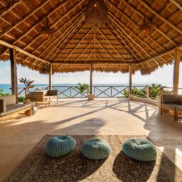 Palapa terrace with seating and ocean view — Casa Coco, Isla Mujeres, Mexico