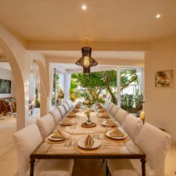 Dining area with long table — Casa Coco, Isla Mujeres, Mexico