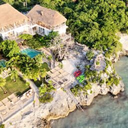 Aerial view of the villa and rocky coastline — Casa Coco, Isla Mujeres, Mexico