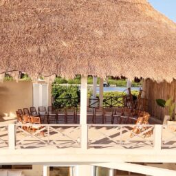 Palapa terrace with event seating — Casa Coco, Isla Mujeres, Mexico
