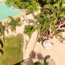 Aerial view of the beach lounge area — Casa Coco, Isla Mujeres, Mexico