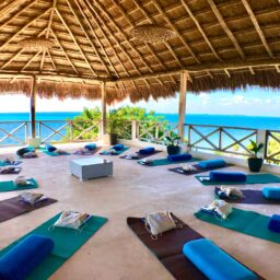 Yoga shala with mats and ocean view — Casa Coco, Isla Mujeres, Mexico