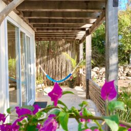 Hammock terrace with bougainvillea — Casa Coco, Isla Mujeres, Mexico
