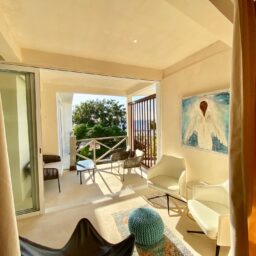 Bedroom balcony sitting area — Casa Coco, Isla Mujeres, Mexico