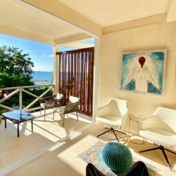 Bedroom sitting area with ocean view — Casa Coco, Isla Mujeres, Mexico