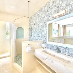 Bathroom with tiled walls and vanity — Casa Coco, Isla Mujeres, Mexico