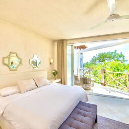 Bedroom with balcony and bed — Casa Coco, Isla Mujeres, Mexico