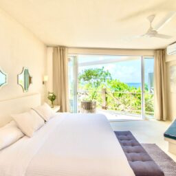 Bedroom with balcony and bed — Casa Coco, Isla Mujeres, Mexico