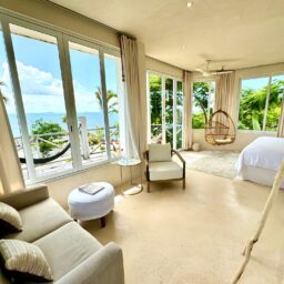 Bedroom with sitting area and ocean view — Casa Coco, Isla Mujeres, Mexico