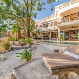 Garden and pool with daybed — Casa Lola, Isla Mujeres, Mexico
