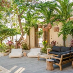 Garden lounge seating — Casa Lola, Isla Mujeres, Mexico