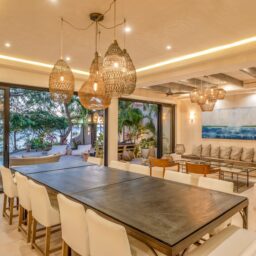 Dining area with long table — Casa Lola, Isla Mujeres, Mexico
