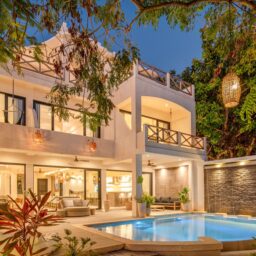 Villa exterior and pool at dusk — Casa Lola, Isla Mujeres, Mexico