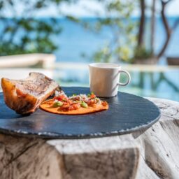 Breakfast served by the pool — Casa Lola, Isla Mujeres, Mexico
