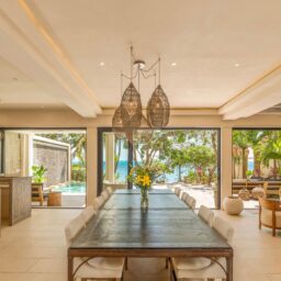 Dining area with long table — Casa Lola, Isla Mujeres, Mexico