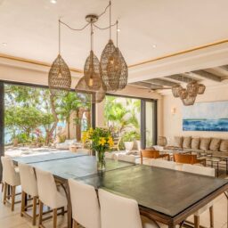 Dining area with long table — Casa Lola, Isla Mujeres, Mexico