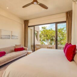 Bedroom with balcony and sofa — Casa Lola, Isla Mujeres, Mexico