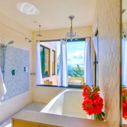 Bathroom with soaking tub and ocean view — Villa Encantada, Isla Mujeres, Mexico