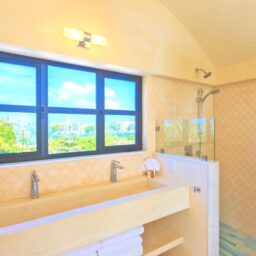 Bathroom with double vanity and view — Villa Encantada, Isla Mujeres, Mexico