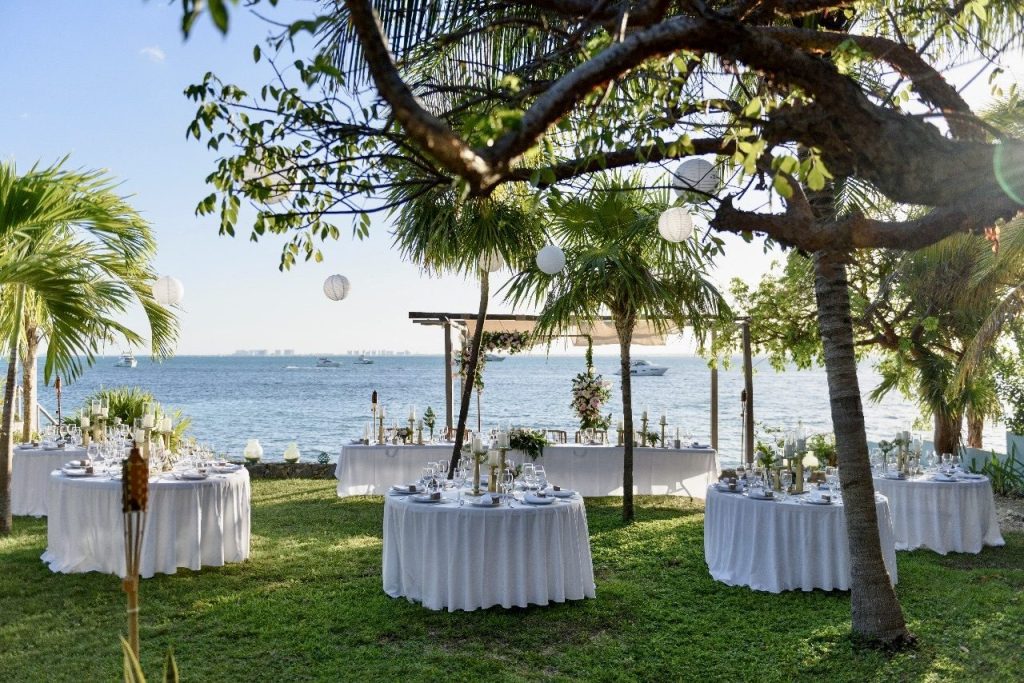 Oceanfront wedding setup at Coco B Isla, Isla Mujeres