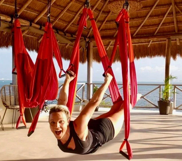 Trapeze yoga at the Casa Coco palapa, Isla Mujeres